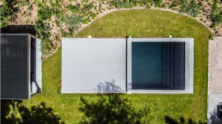Drone view, half open coverseal pool cover