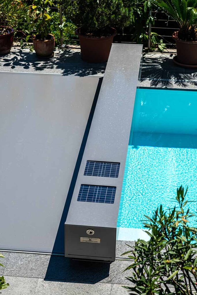 Solar-powered pool cover patented system half closed