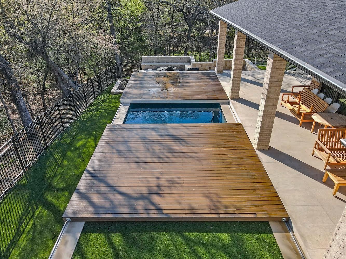 S-LIDE™ - Sliding deck pool cover by COVER DREAM - 2 platforms with a wood deck in Texas