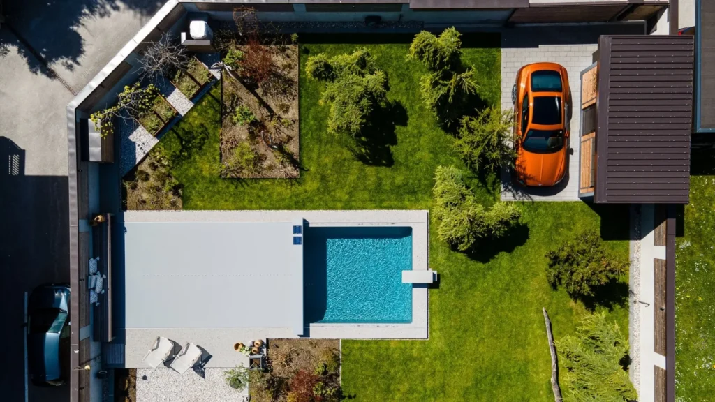 Pool Covered with a Coverseal in a Modern Backyard