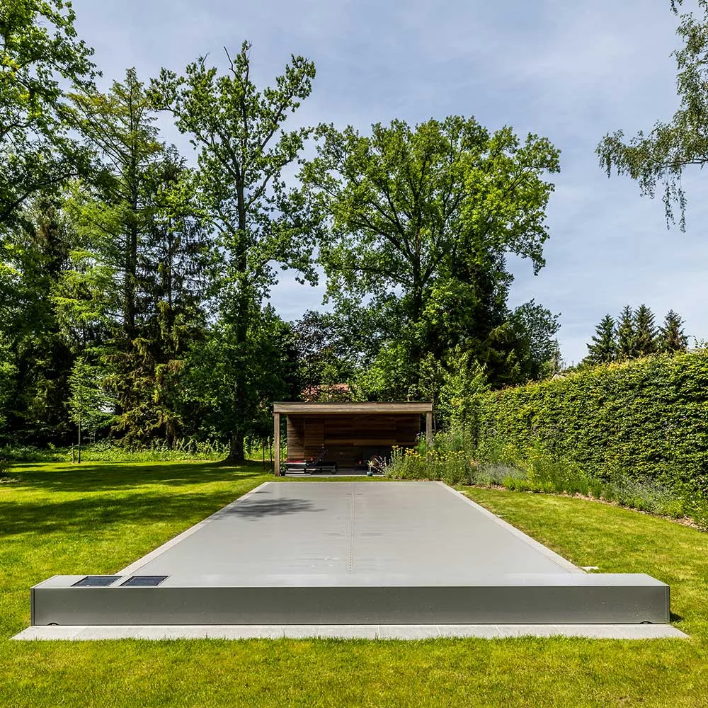 Pool cover membrane and housing inspected for damage, tension changes, and obstruction
